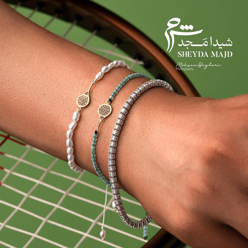 دستبند طلا طرح راکت تنیس و مروارید ریز